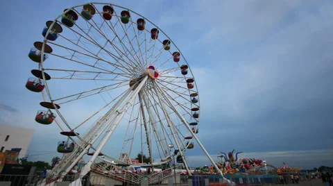 Time lapse twilight shot of funfair amusement park. UHD 4k. Stock Footage 54335008