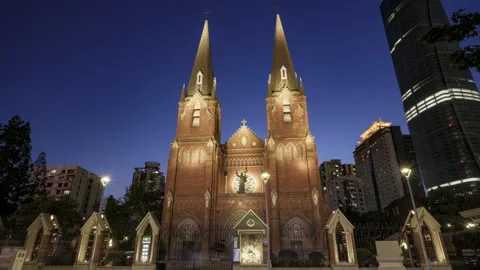 Time Lapse: Twilight at Xujiahui Cathedral of Saint Ignatius in Shanghai Skyline Stock Footage 337899106