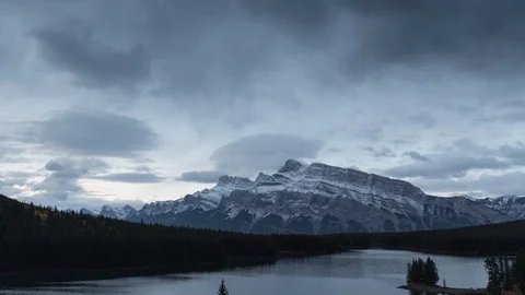 Time lapse of Two Jack Lake cloudscape at sunrise, Rocky mountains (Canadian Stock Footage 95905370
