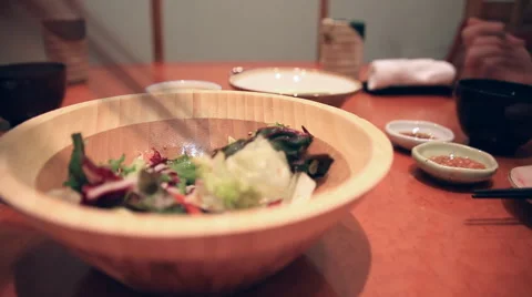Time lapse of two people eating sushi at the luxurious Japanese restaurant Stock Footage 61165600