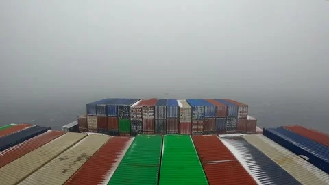 Time lapse of ultra large container ship шт snow storm in Pacific ocean Stock Footage 244385065
