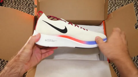 Time-Lapse Unboxing Nike Running Shoes Stock Footage 302808170