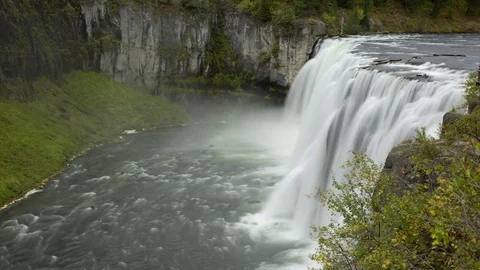 Time lapse of Upper Mesa Falls waterfall in Idaho on a overcast Summer day Stock Footage 78012541
