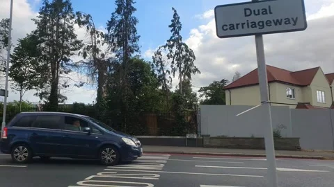 Time Lapse. Urban Car Drive Through City Streets of United Kingdom Stock Footage 340537579