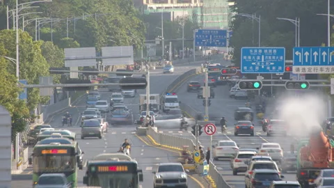 Time Lapse Urban Flow: Busy Chinese Intersection with Streaking Traffic Stock Footage 321623624