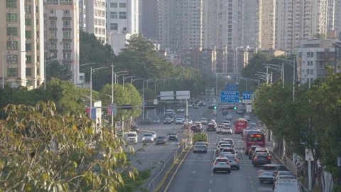 Time Lapse Urban Flow: Busy Chinese Intersection with Streaking Traffic Stock Footage 321623698