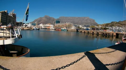 Time lapse of V&amp;A Waterfront in Cape Town with Table Mountain in the background Stock Footage 64639617