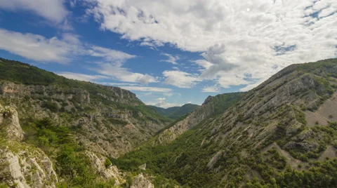 Time lapse in Val Rosandra valley near Trieste with sunny and cloudy weather Video stock 49058747