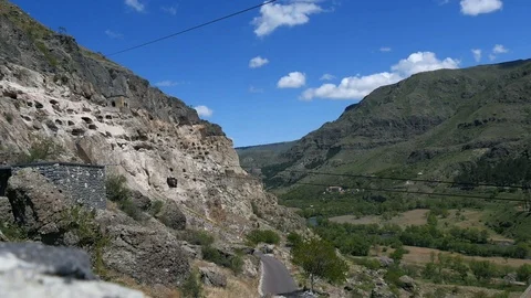 Time lapse Vardzia cave monastery. Cave town in the mountains.  Stock Footage 90351194