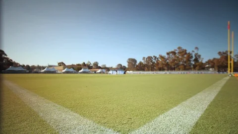 Time-lapse of various activities at American football field on a sunny day Stock Footage 105427765