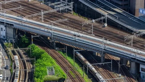Time lapse of various trains running in the urban city. Rail traffic. Stock Footage 154229649