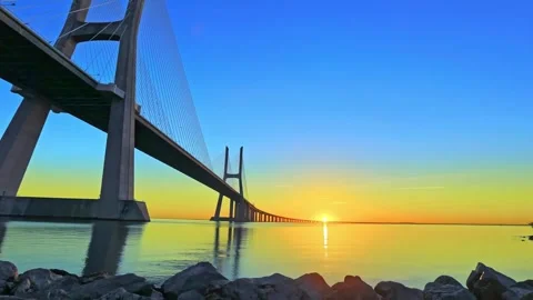 Time-lapse of Vasco da Gama Bridge on Tagus River at sunrise, Lisbon in Portugal Stock Footage 147195576