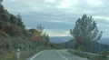 Time-lapse of vehicle rushing at wild speed on serpentine road in mountains 4k or 4k+ Resolution