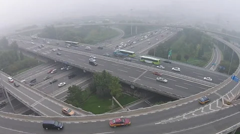 Time Lapse of vehicles driving on an overpass amid the heavy haze and smog Stock Footage 42671546