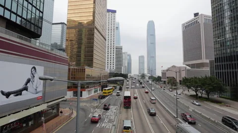 Time Lapse of vehicles running among office buildings in Hong Kong Central. Stock Footage 45134172