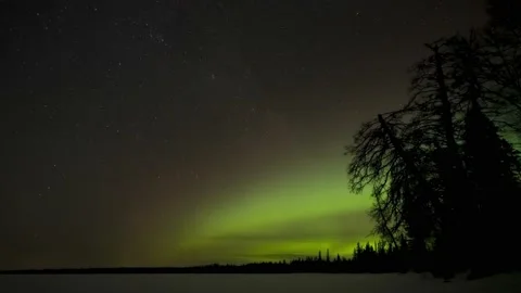 Time lapse of very active green over a frozen snow-covered lake Stock Footage 149842638