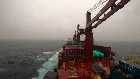 Time lapse of vessel in rain &amp; rough waves &amp; seas Stock Footage 115820063