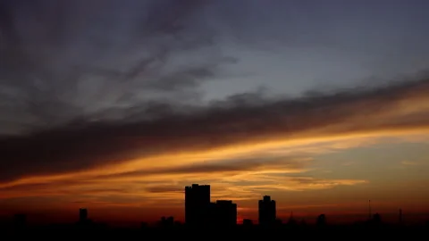 Time-lapse of Vibrant colors spread across the sky Stock Footage 321628880