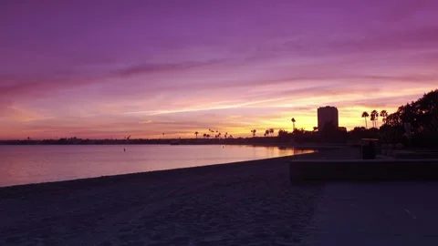 Time lapse of a vibrant sunset over a bay in San Diego, California, with co.. Stock Footage 283481014