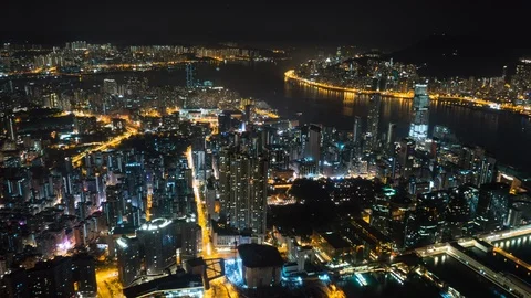 Time Lapse of Victoria Harbor &amp; Hong Kong Skyline at Night Stock Footage 87146853