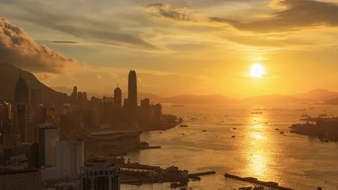 Time lapse of Victoria harbour and Hong Kong city at sunset Stock Footage 105884953