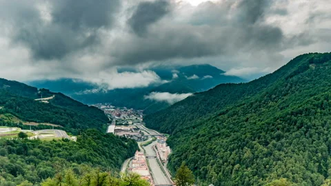 Time lapse video. Aerial view - evening at the Rosa Khutor ski resort. Fog Stock Footage 122054997
