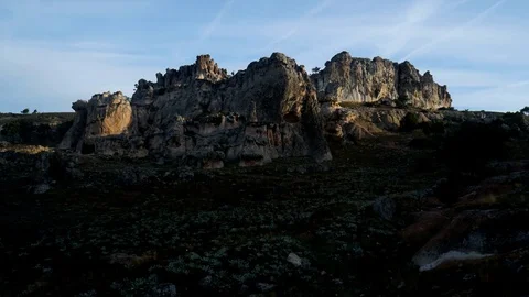 Time lapse video of archeological area sun is rising over the ancient rocks  Stock Footage 82187779