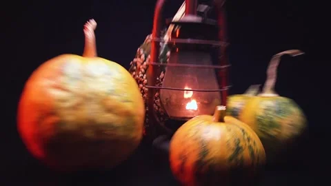 Time-lapse video art scary Halloween pumpkins and an old kerosene lamp Stock-Footage 286207970