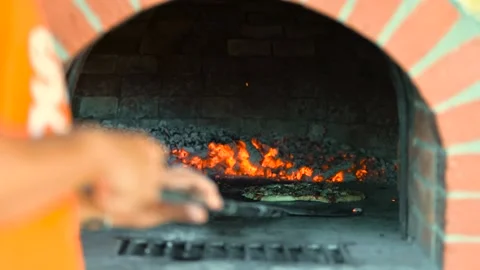 Time-lapse video of baking pizza in an wood fired oven Stock Footage 132762874
