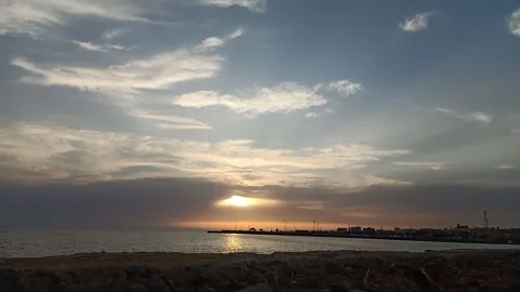 Time lapse video from the beach moving clouds over the sea in Duba Stock Footage 196547404