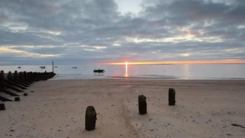 Time Lapse Video of Beautiful Sunrise at Plage des Sableaux, Noirmoutier, France Stock Footage 320120901