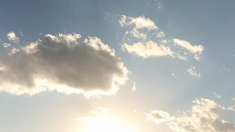 Time lapse video of bright sunshine and rolling clouds. Stock Footage 255623910