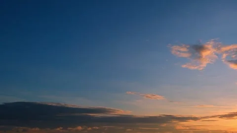 A time-lapse video captures a beautiful sunrise sky. Video stock 314096044