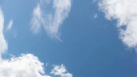 Time lapse video of a clear blue sky with moving clouds. Vertical footage Stock Footage 254469351