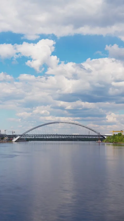 Time-Lapse Video of Clouds Floating Over the Dnieper River in a Sunny Day. .. Stock Footage 244985363