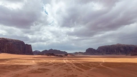 Time lapse video of clouds move fast over desert landscape Stock Footage 109084976