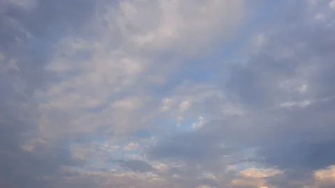 Time lapse video of clouds moving in the evening sky. Stock Footage 129587256