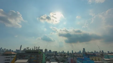 Time lapse video of clouds rapidly running over the city . Video stock 134813633