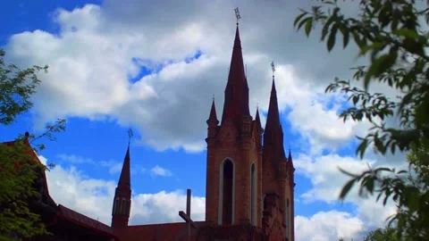 Time lapse Video Clouds in the sky with a organ temple Stock Footage 182343227