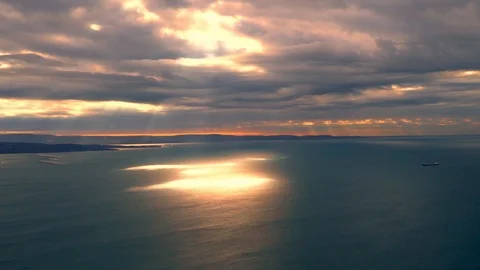 Time lapse video of cloudy sky moving fast over the sea with strong wind Stock Footage 99641770