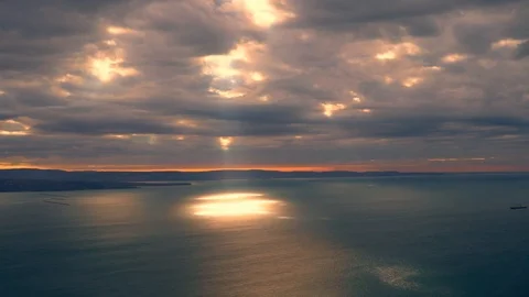 Time lapse video of cloudy sky moving fast over the sea with strong wind Stock Footage 99642818