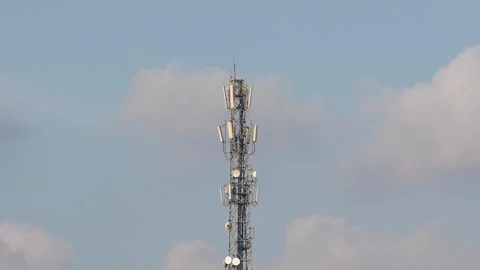 Time lapse video of a communication tower and moving clouds Video stock 242203367