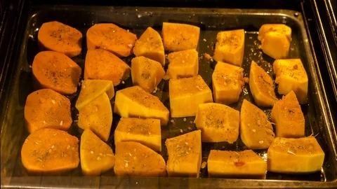 Time lapse video of cooking pumpkin in oven Stock Footage 70433932