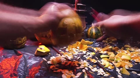 Time-lapse video cutting art scary halloween pumpkins and old kerosene lamp Video stock 286208023