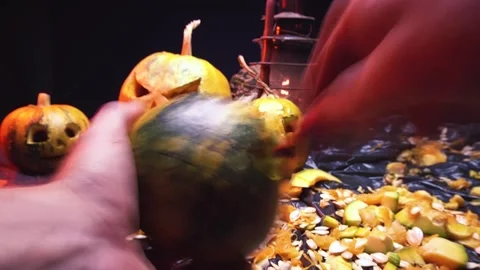 Time-lapse video cutting art scary halloween pumpkins and old kerosene lamp Stock Footage 286208037