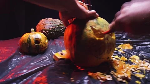 Time-lapse video cutting art scary halloween pumpkins and old kerosene lamp Video stock 286208038