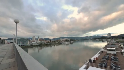Time lapse video of the Danube River on a cloudy day at dusk in Linz, Austria Stock Footage 70793162