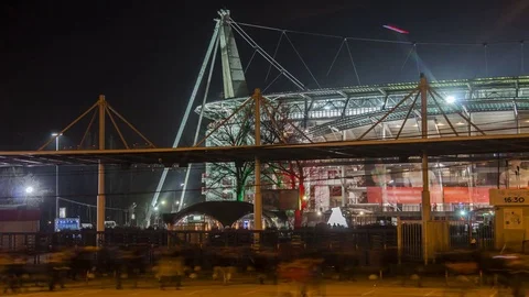 Time lapse video of the flow of fans after the football match Stock Footage 73489442