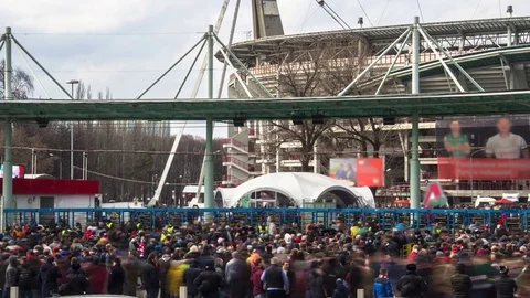 Time lapse video of the flow of fans and mounted police before the football.. Stock Footage 73597814