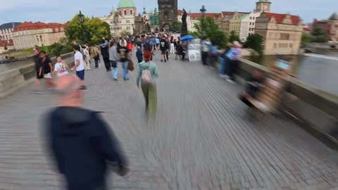 Time Lapse Video Frame of Tourists Walking on Historic Charles Bridge, Prague Stock Footage 325445415